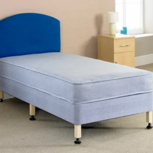 A bed with 6 legs and a blue mattress and headboard.